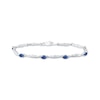 Thumbnail Image 1 of Oval-Cut Blue Lab-Created Sapphire & Diamond Accent Wavy Link Bracelet 7.25&quot;