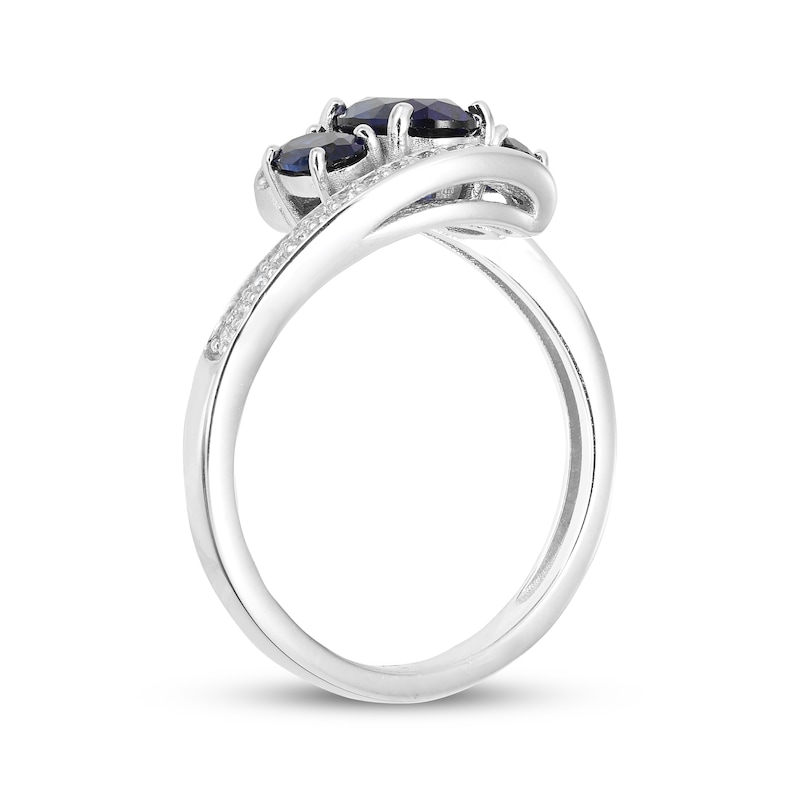 Main Image 2 of Memories Moments Magic Oval-Cut Blue Lab-Created Sapphire & Diamond Three-Stone Bypass Ring 1/8 ct tw Sterling Silver