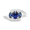 Thumbnail Image 3 of Memories Moments Magic Oval-Cut Blue Lab-Created Sapphire & Diamond Three-Stone Bypass Ring 1/8 ct tw Sterling Silver