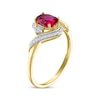 Thumbnail Image 2 of Oval-Cut Lab-Created Ruby & Diamond Bypass Ring 1/15 ct tw 10K Yellow Gold