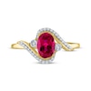 Thumbnail Image 3 of Oval-Cut Lab-Created Ruby & Diamond Bypass Ring 1/15 ct tw 10K Yellow Gold