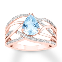 Blue Topaz Ring 1/5 ct tw Diamonds 10K Rose Gold