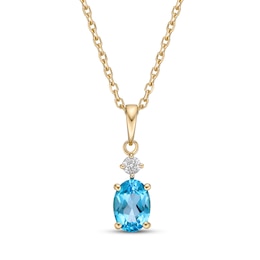 Swiss Blue Topaz & Diamond Necklace 1/20 ct tw Oval/Round-Cut 10K Yellow Gold 18&quot;