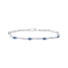 Thumbnail Image 1 of Oval-Cut Swiss Blue Topaz & Diamond Accent Wavy Link Bracelet Sterling Silver 7.25&quot;