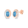 Thumbnail Image 0 of Oval-Cut Swiss Blue Topaz & Diamond Swirl Stud Earrings 1/15 ct tw 10K Rose Gold
