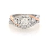 Thumbnail Image 1 of Previously Owned THE LEO Diamond Round-Cut Halo Twist Bridal Set 1-1/5 ct tw 14K Two-Tone Gold