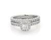 Thumbnail Image 0 of Previously Owned Monique Lhuillier Bliss Round-Cut Diamond Halo Bridal Set 1-1/6 ct tw 18K White Gold Size 6