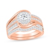 Thumbnail Image 1 of Round-Cut Diamond Halo Bypass Bridal Set 5/8 ct tw 10K Rose Gold