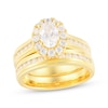 Thumbnail Image 0 of Oval-Cut Diamond Halo Bridal Set 1-1/2 ct tw 14K Yellow Gold